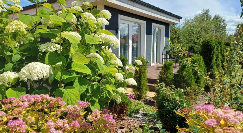 Foto de Family Garden House with Free Private Parking, Playground, BBQ and AirCond - Reserva con descuento Agoda
