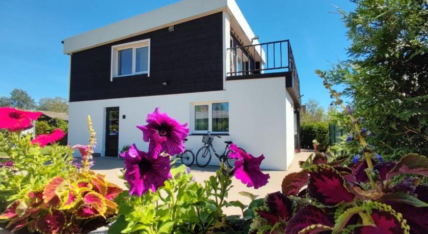 Foto de 4 Bedroom House with Playground, BBQ & Free Parking - Reserva con descuento Agoda