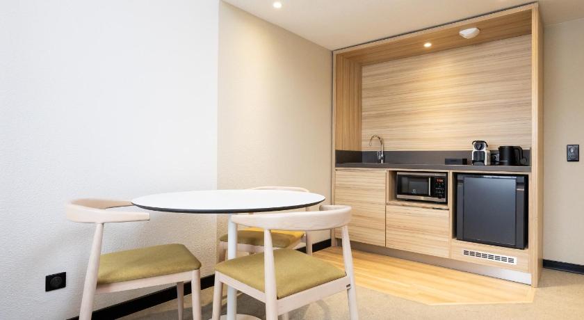 Image of Superior non-smoking suite with 1 double bed an d single convertible sofa 15