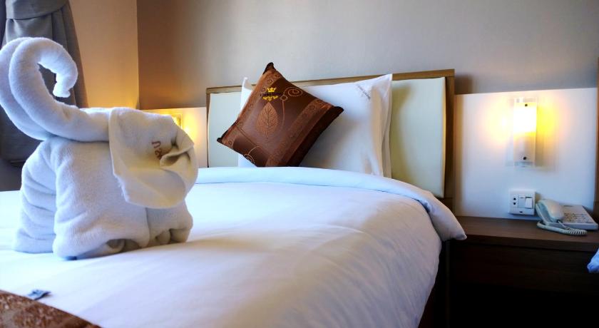 Image of Comfort Quadruple Room with Garden View 3
