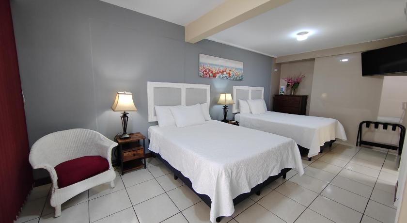 Image of Superior Double Room with Two Double Beds 0