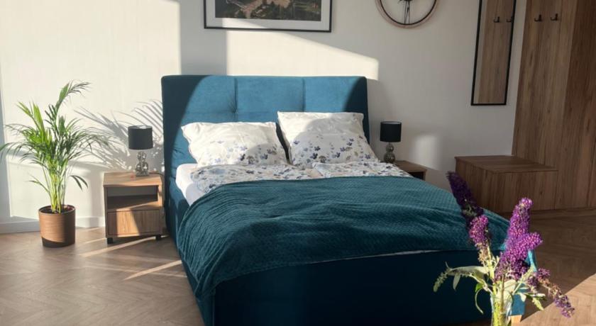 Apartament Sloneczny widok boczny na jezioro