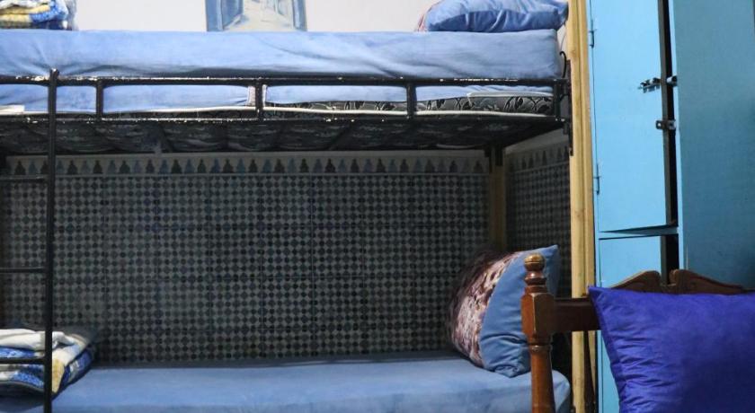 Image of Single Bed in Female Dormitory Room 0