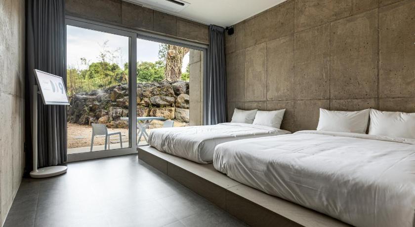 チェジュ Jeju Nueve Poolvilla & Resort 5つ星 ホテル レストラン