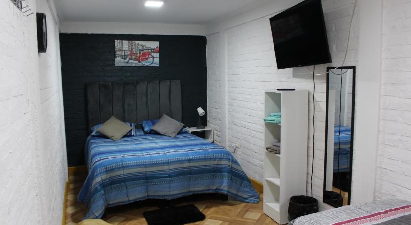 Imagen de Habitación Familiar Deluxe (Deluxe Family Room) 1