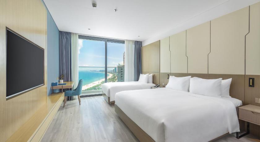 Bild von: Premier Dreibettzimmer mit seitlichem Meerblick und Balkon (Premier Triple Partial Sea View with Balcony) 1