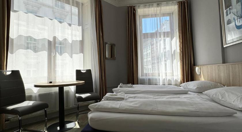 Image of Triple Room With Private Shower and Shared Toilet 0