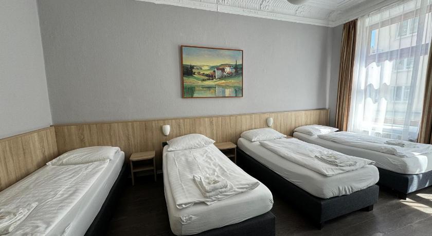 Image of Quadruple Room with Private Shower and Shared Toilet 5