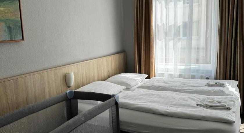 Image of Quadruple Room with Private Shower and Shared Toilet 4