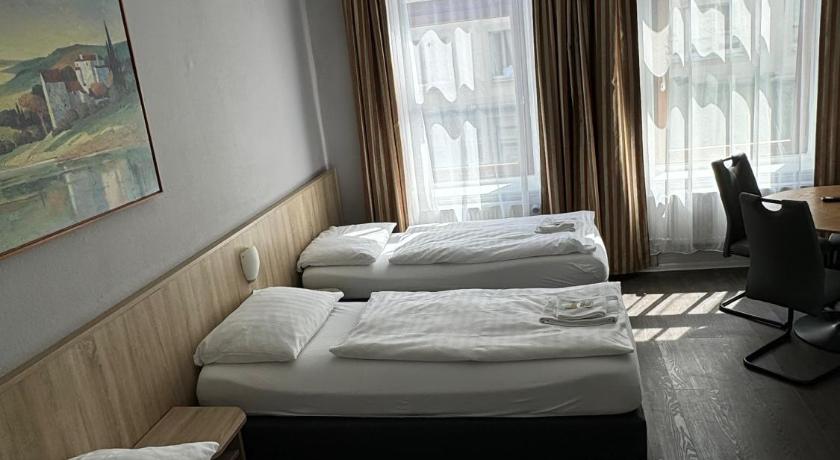 Image of Quadruple Room with Private Shower and Shared Toilet 10