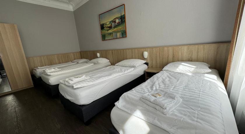 Image of Quadruple Room with Private Shower and Shared Toilet 13