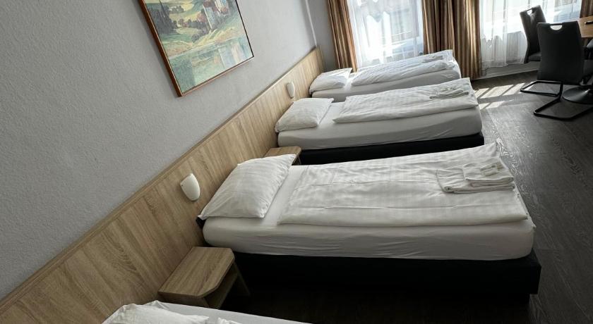 Image of Quadruple Room with Private Shower and Shared Toilet 17