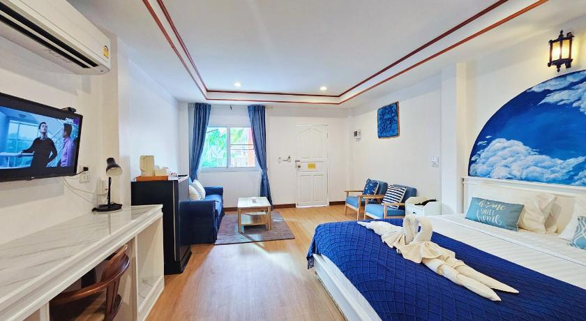 Фото: Бунгало с двуспальной кроватью, с видом на сад (Garden View Bungalow Double Bed) 5
