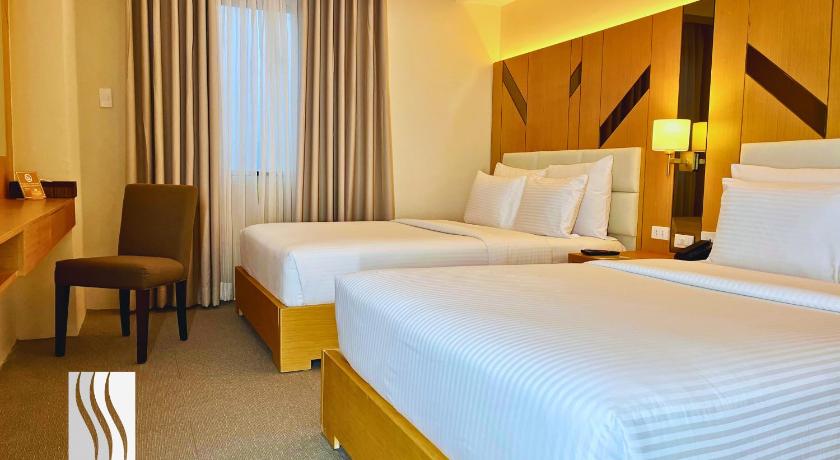 Image of Deluxe Double Room with Two Double Beds 8