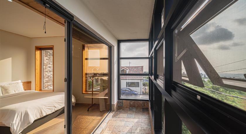 Jeju Le Village Aewol building A 4-Star Accommodation lobby