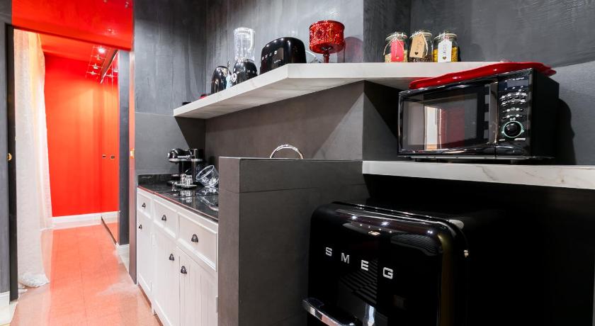 Фото: Улучшенные апартаменты с 1 спальней (Superior One-Bedroom Apartment) 17