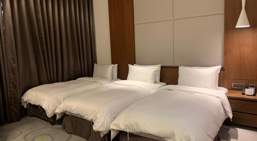 Image of Deluxe Triple Room 0
