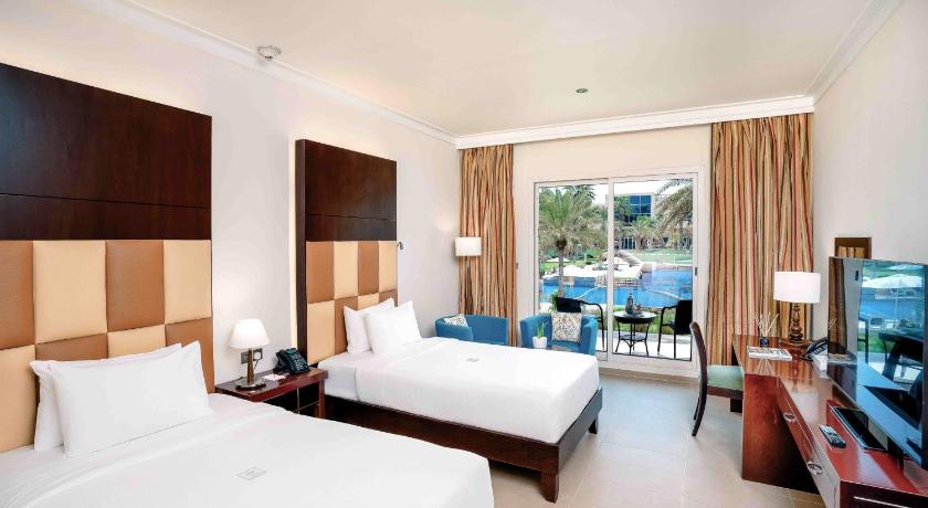 Image of Deluxe Room Pool View 0