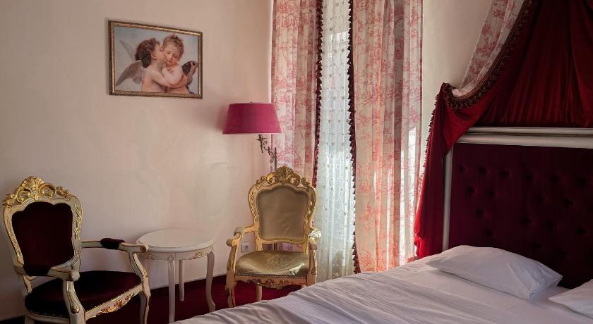 รูปของห้องดีลักซ์เตียงใหญ่พร้อมระเบียง (Deluxe Double Room with Balcony) 4