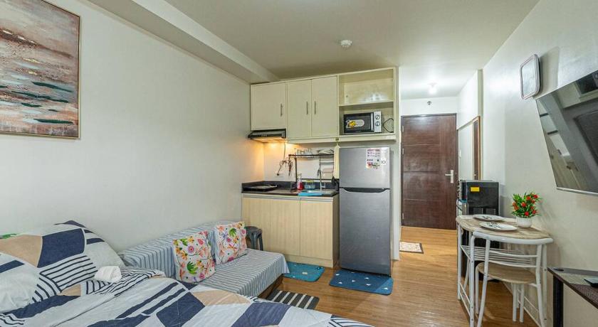 セブ Condo • WIFI up to 100mbps • Pool • Netflix&Chill 3つ星 ゲストハウス プール