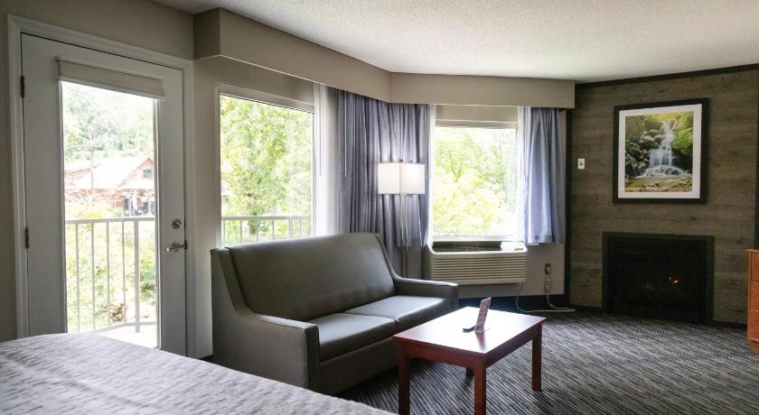 Image of King Room w/ Soaking Tub, Sofa Bed w/ fire place & private balcony 3