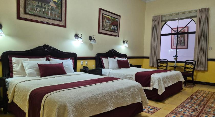 Image of Deluxe Queen Room with Two Queen Beds 0