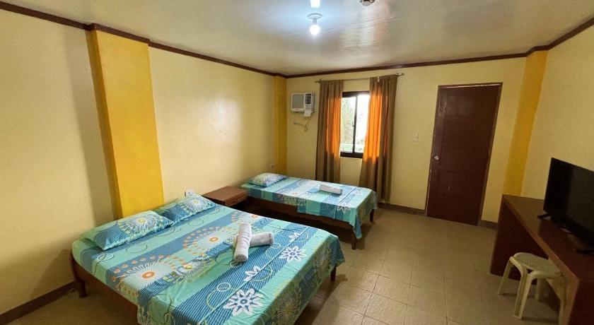 Image of Standard Triple Room with Sea View 0