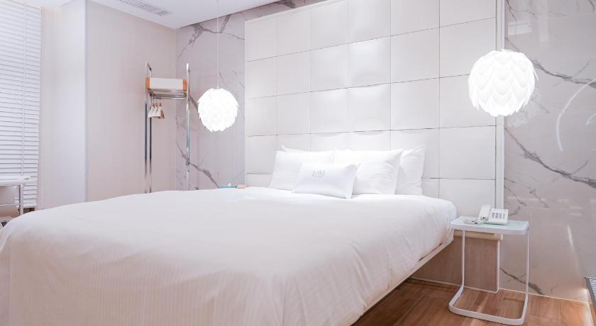 Image of Deluxe Double Room with Jacuzzi and 86 inch Flat-screen TV 1
