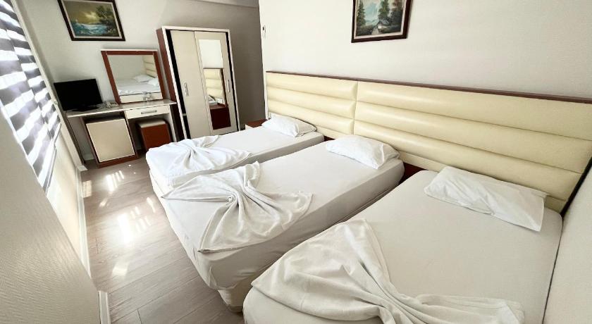 Imatge de Habitació Deluxe Triple (Deluxe Triple Room) 3