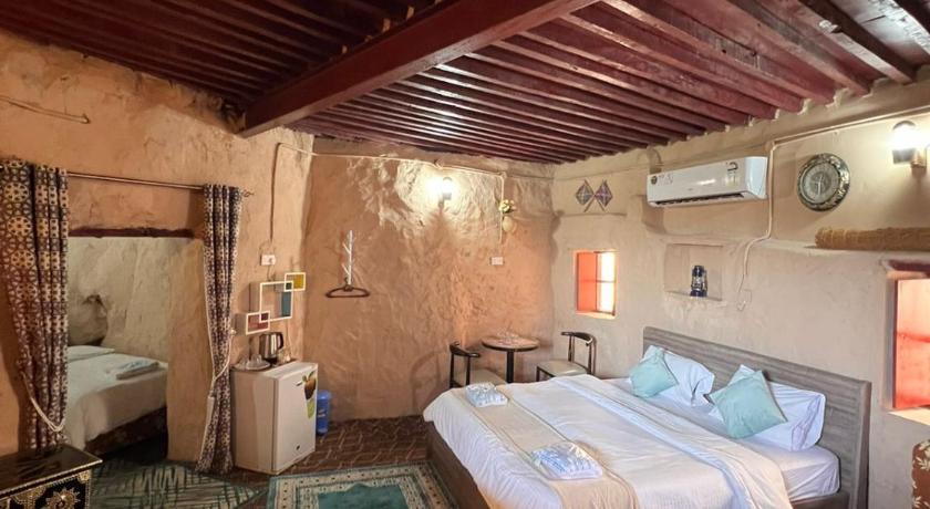 Image of Triple Room with Private Bathroom 6