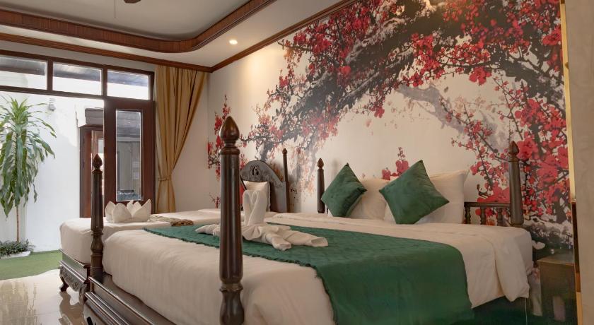 Image of Deluxe Triple Room 0