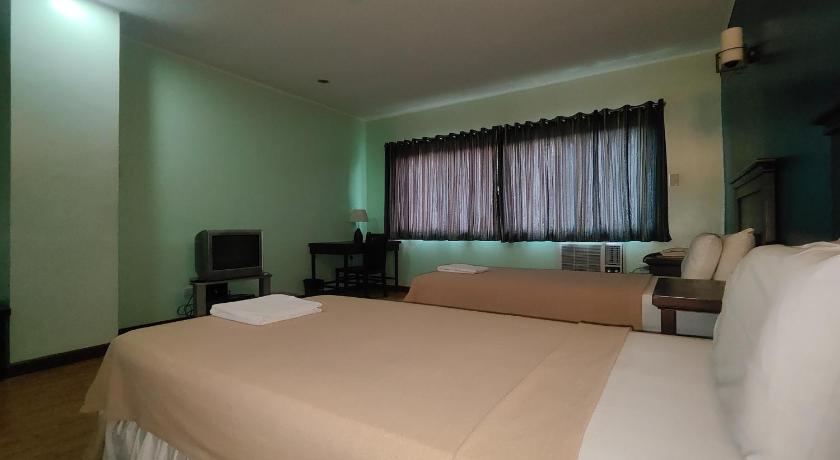 セブ Oftana Suites Cebu near Oakridge 3つ星 ホテル レストラン