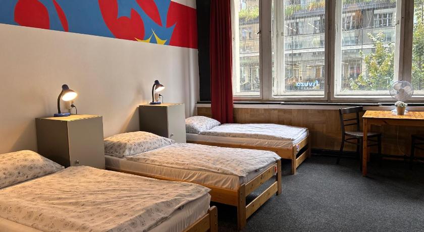 Image of Economy Quadruple Room with Shared Bathroom 0