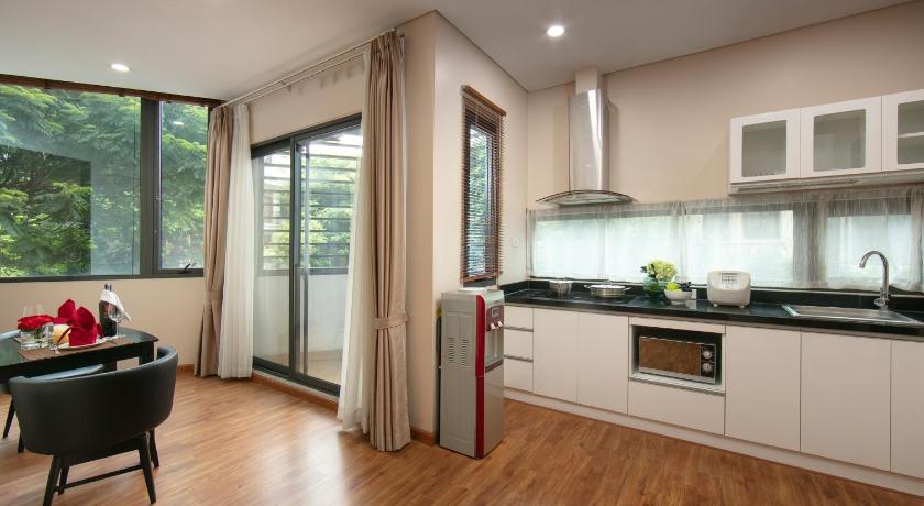 ハノイ HB Serviced Apartment - 12 Trần Quý Kiên 3つ星 ホテル レストラン
