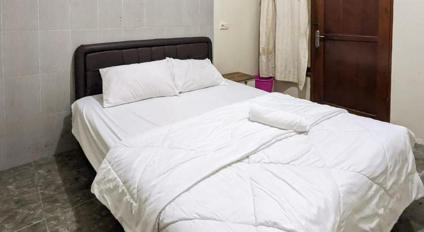 OYO 93987 Suropati 2 Guest House - image 38
