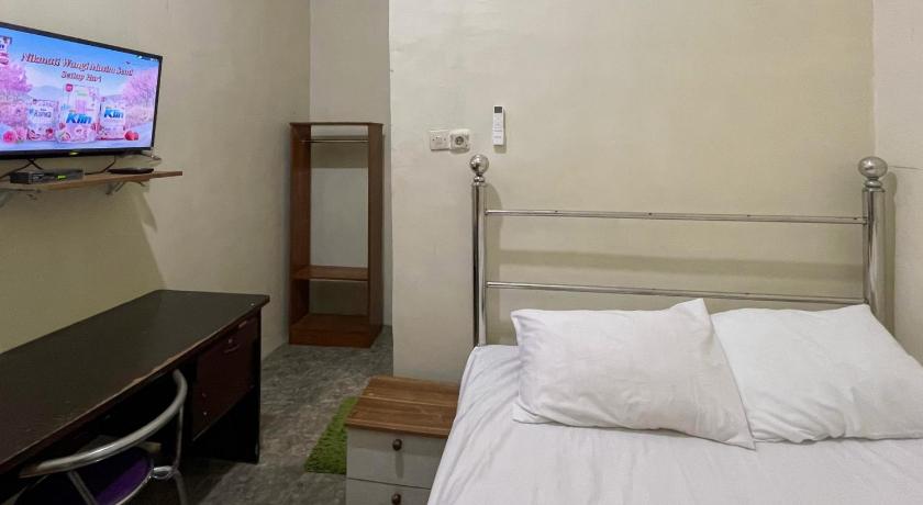 OYO 93987 Suropati 2 Guest House - image 36