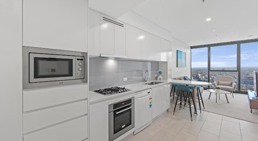 Image of 2-Bedroom Sky High View Compact Apartment with 1 Bathroom 1