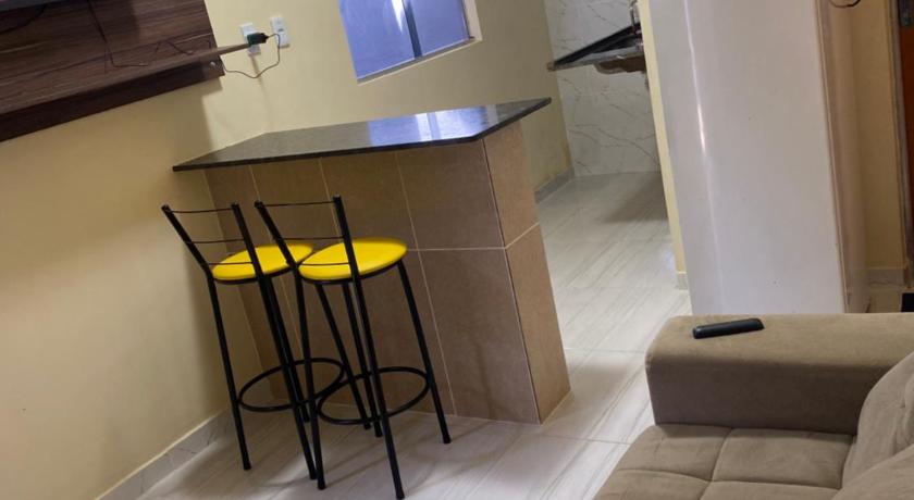 Flats com ar condicionado, garagem e internet