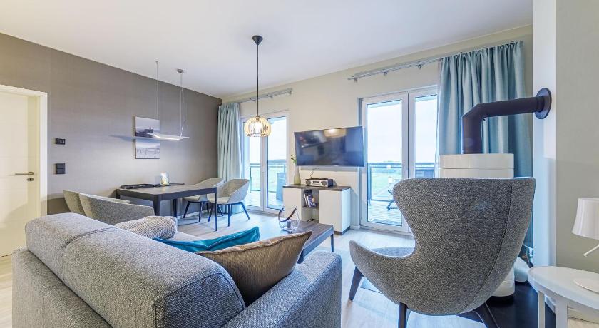 Strandgeflüster - Modernes Apartment mit Ostsee- und Boddenblick