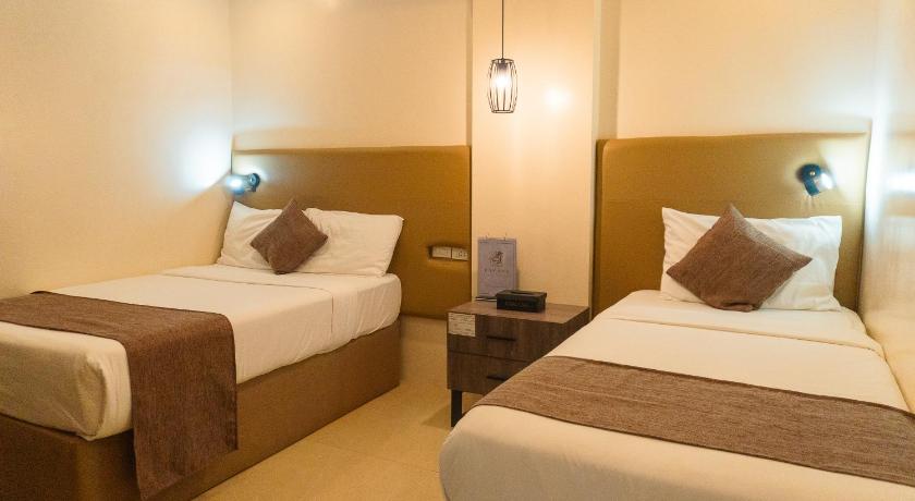 Image of Deluxe Triple Room 0