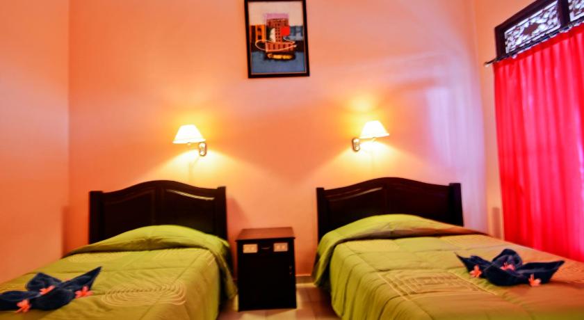 Pesona Beach Inn photo