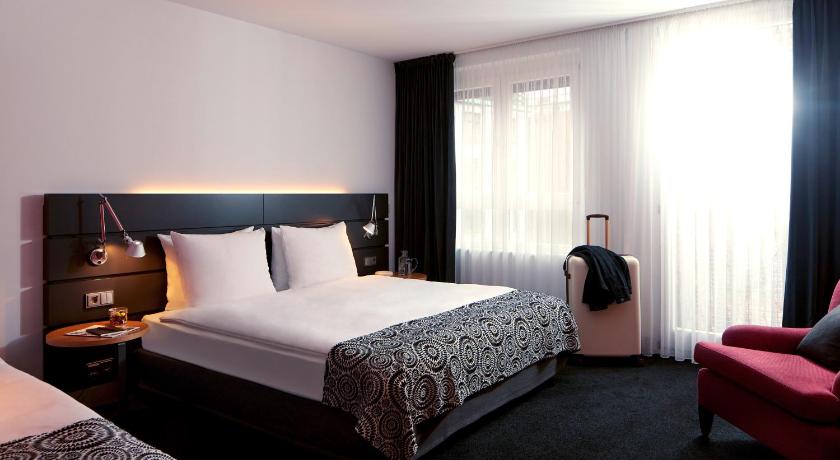 Image of Comfort Triple Room with Kitchenette 0