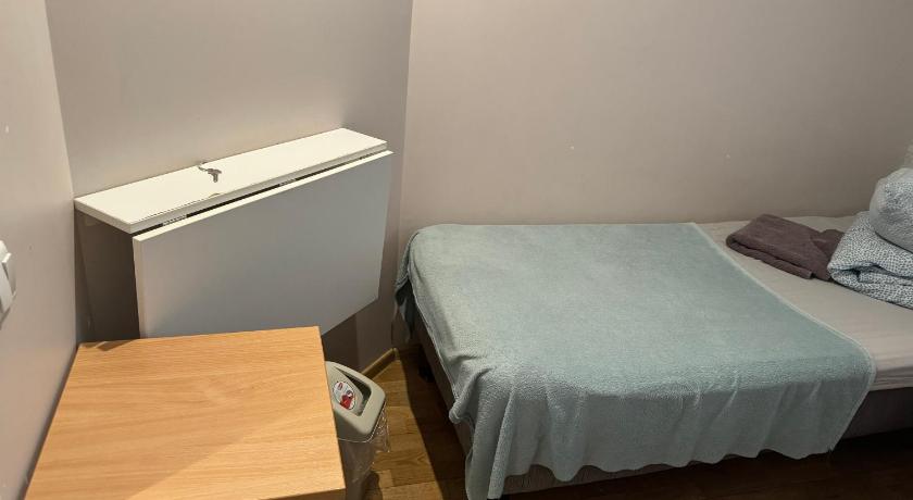 Image of Single Bed in Male Dormitory Room - Semi-Basement Floor 13