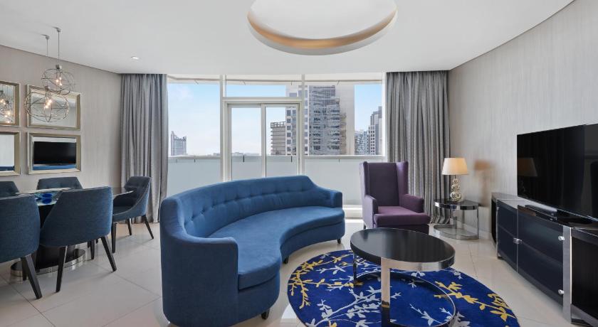 Image of Three Bedroom Suite with Private Balcony - City Skyline View 4