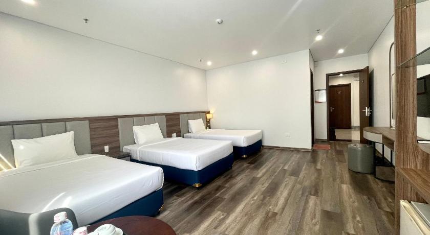 Image of Deluxe Triple Room with Sea View 1