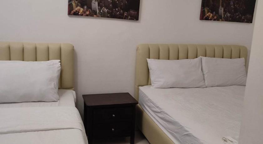 Kuva huoneesta Deluxe - Kahden hengen huone - Double - Sis. 2 parivuodetta (Deluxe Double Room with Two Double Beds) 7