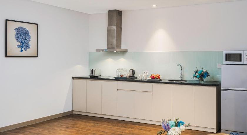 Immagine di Suite Deluxe con 3 Camere da Letto (Deluxe Three Bedroom Suite) 1