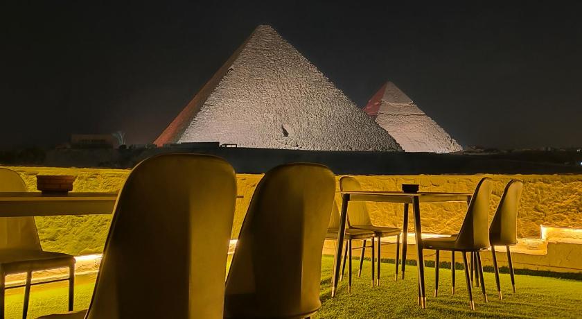 Maria Pyramids House