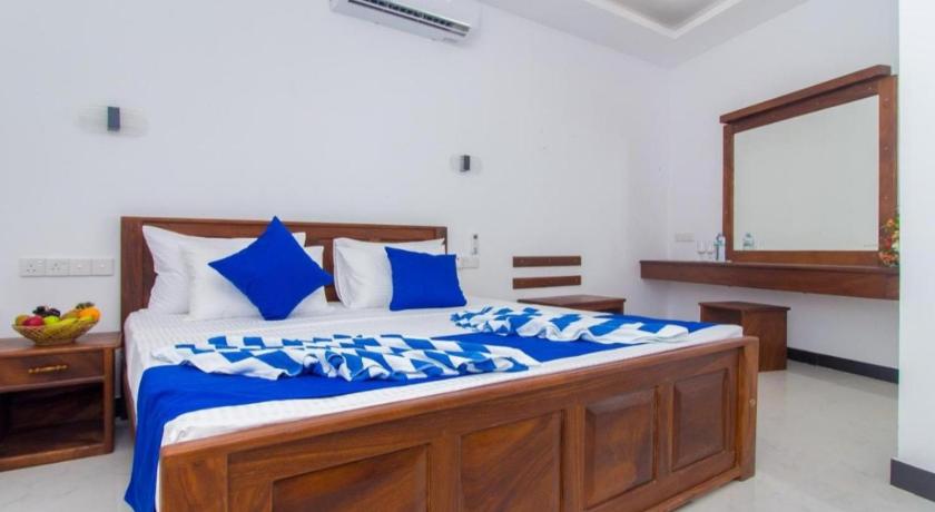 صورة ثلاثية إكزكيوتيف (Executive Triple Room) 0