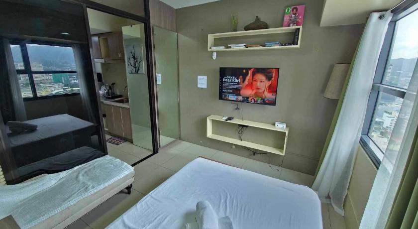 セブ Cozy Condo in the City Center at Horizons 101 3つ星 ホテル スイート